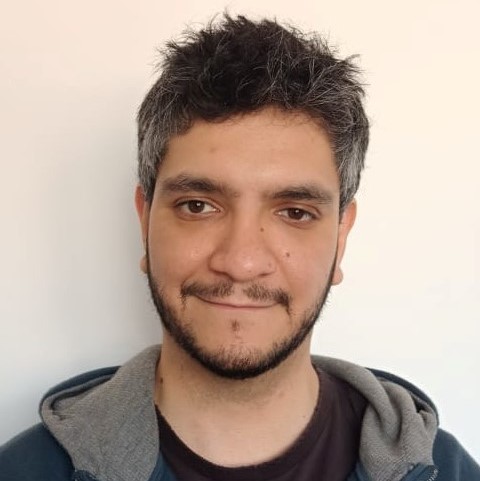 Headshot of Pablo S. Milla Carmona with short dark hair and a beard.